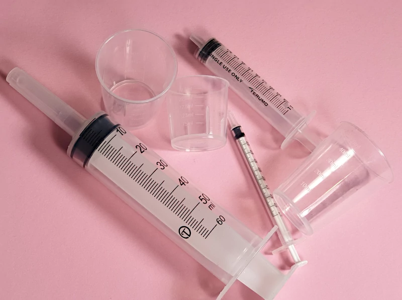 cups-syringes-nail-polish-measuring measuring cups and syringes for nail polish making
