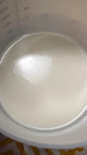 Separated soap that has been coloured with titanium dioxide