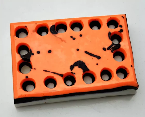 carved soap with dots